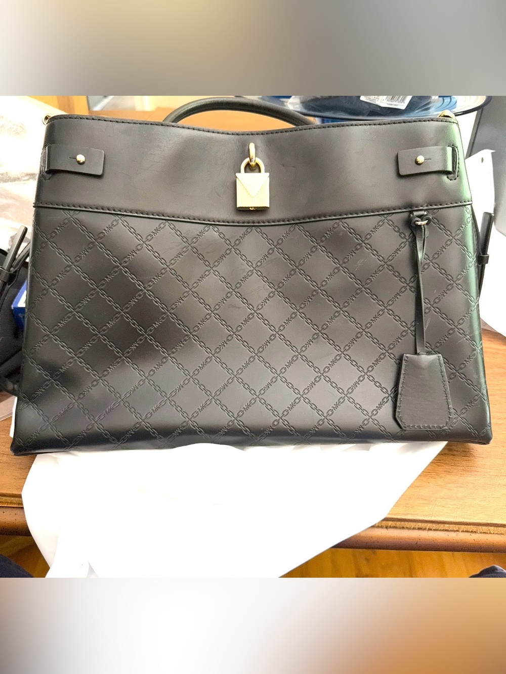 Michael Kors Gramercy Large Leather Black Satchel a chain-embossed pattern.